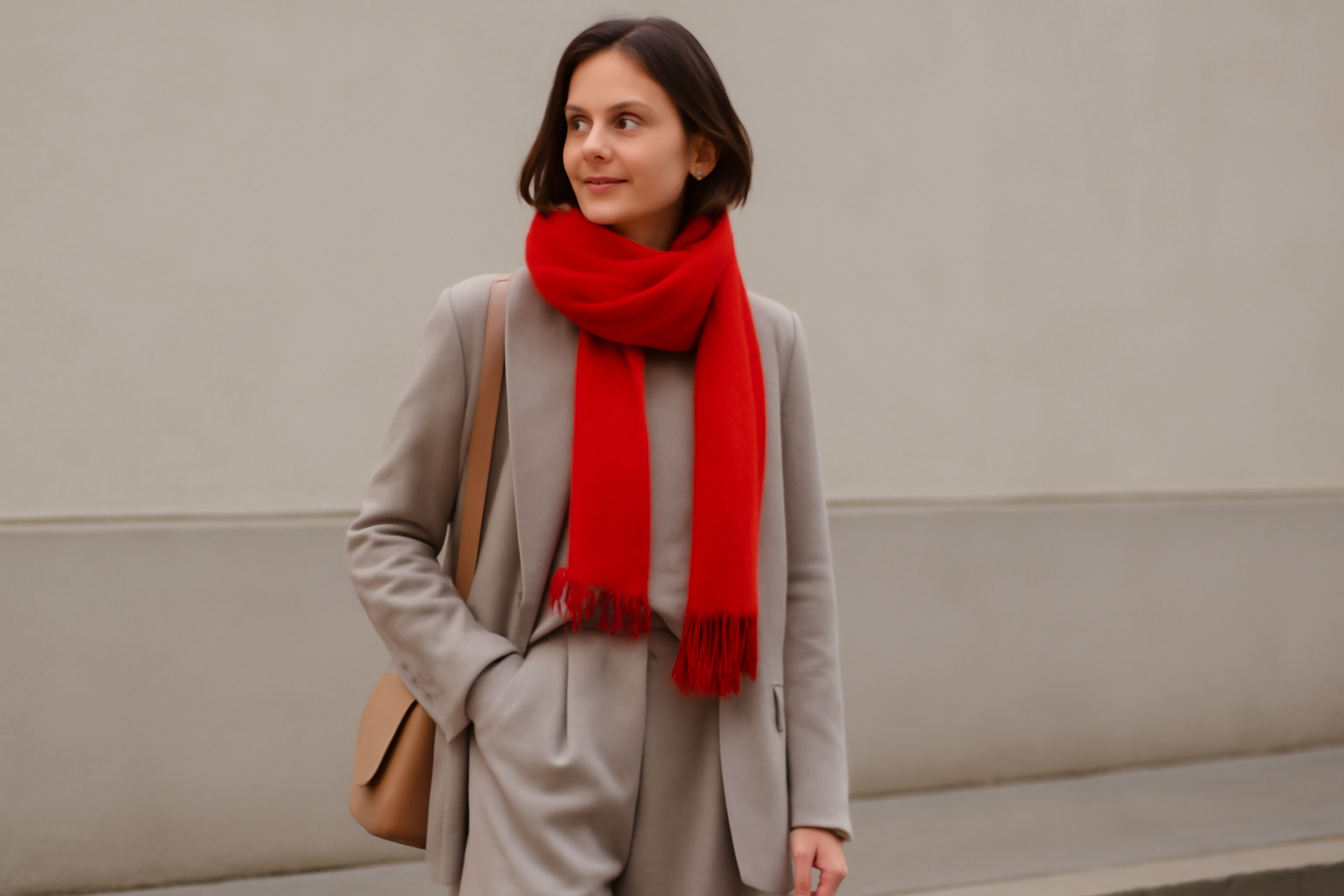 "Woman in beige suit."