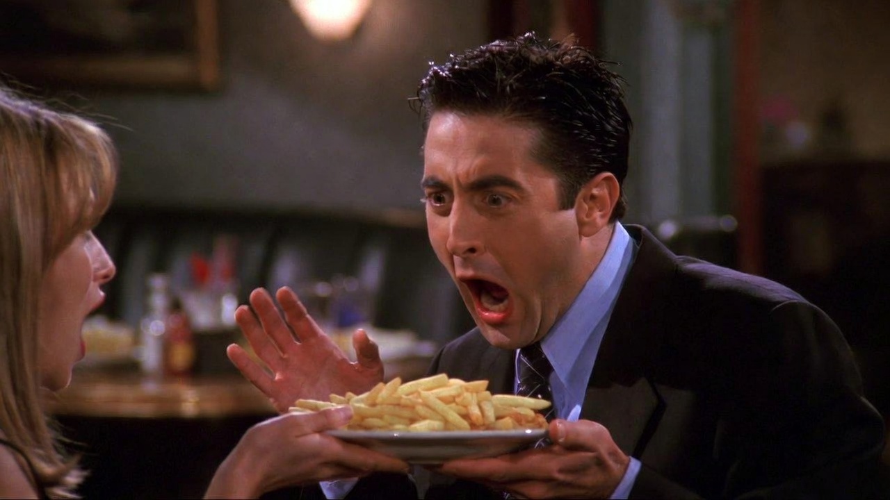 Joey Tribbiani refusing to share food on a disastrous date in Friends, classic "Joey doesn't share food" funny scene