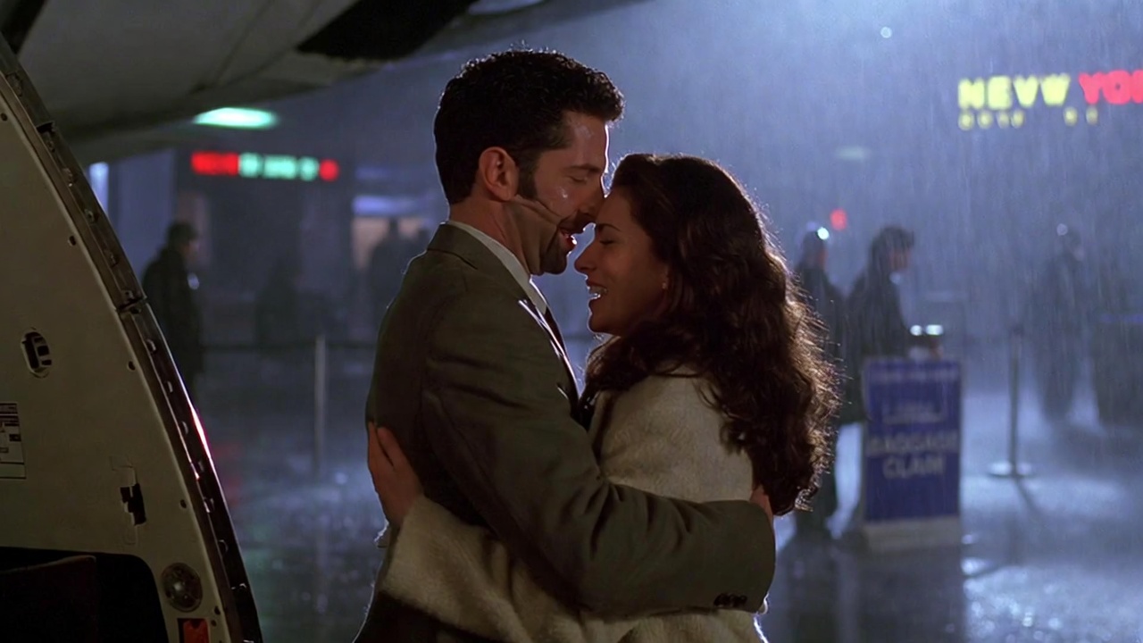 Ross and Rachel's iconic airport reunion in Friends series finale, ultimate romantic payoff